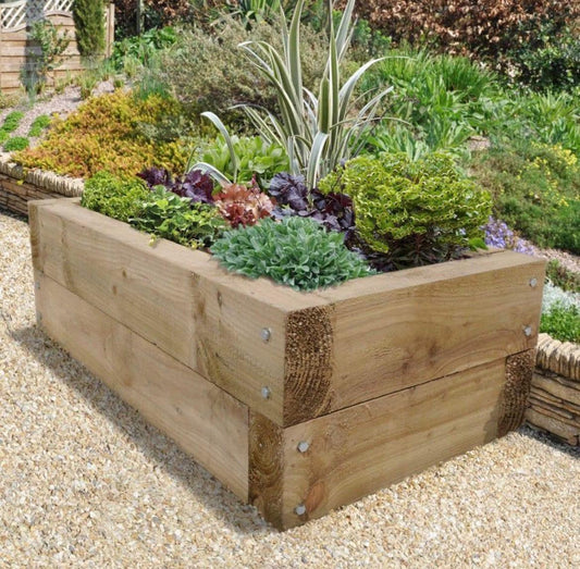 Handmade sleeper raised beds